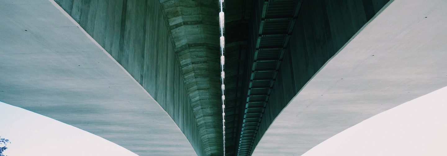 Underneath concrete bridge